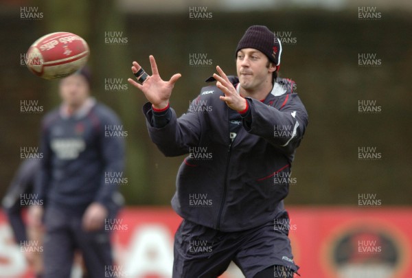 310107 - Wales Rugby Training - Hal Luscombe passes during training 