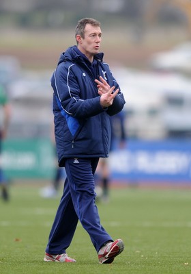 31.01.11 - Wales Rugby Training - Wales assistant coach Rob Howley talks to players during training. 
