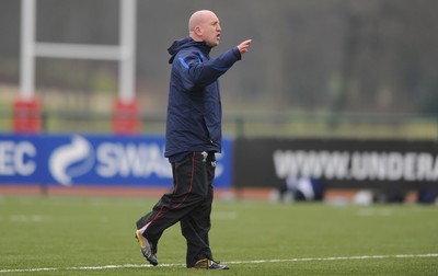 31.01.11 - Wales Rugby Training - Wales assistant coach Shaun Edwards talks to players during training. 