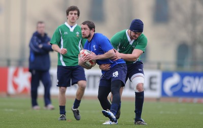 31.01.11 - Wales Rugby Training - Shane Williams is tackled by Jack Gadd of Wales under 20s during training. 