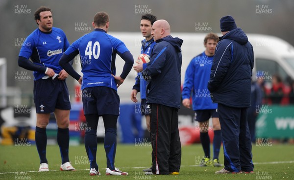 31.01.11 - Wales Rugby Training - Wales assistant coach Shaun Edwards talks to players during training. 