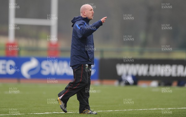 31.01.11 - Wales Rugby Training - Wales assistant coach Shaun Edwards talks to players during training. 