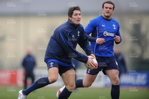31.01.11 - Wales Rugby Training - James Hook in action during training with Jamie Roberts(R). 