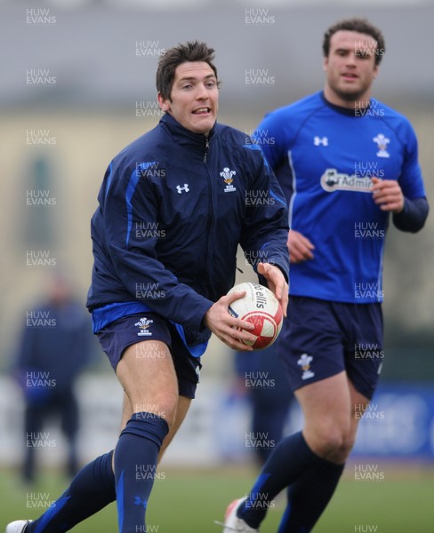 31.01.11 - Wales Rugby Training - James Hook in action during training with Jamie Roberts(R). 