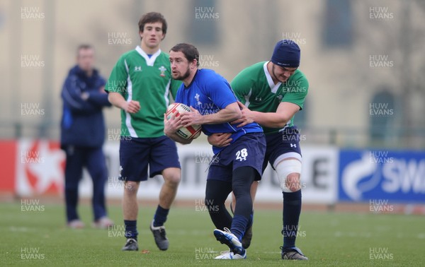 31.01.11 - Wales Rugby Training - Shane Williams is tackled by Jack Gadd of Wales under 20s during training. 
