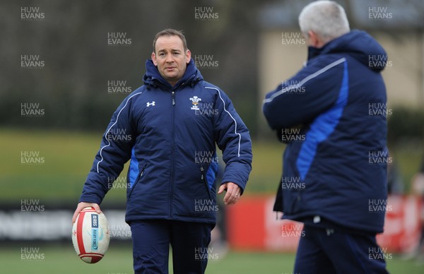 31.01.11 - Wales Rugby Training - Wales under 20 head coach Darren Edwards talks to Wales head coach Warren Gatland during training. 