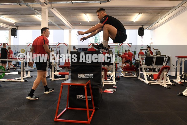 310122 - Wales Rugby Training - Josh Adams and Tomos Williams during a gym session