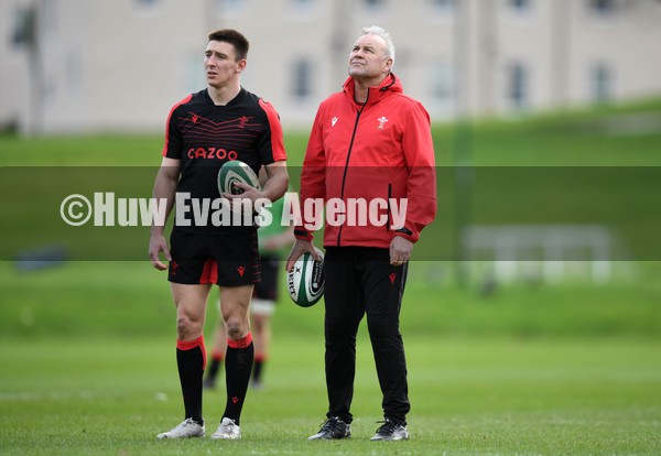 310122 - Wales Rugby Training - Josh Adams and Wayne Pivac during training