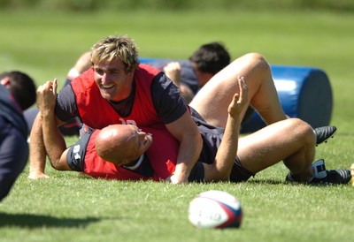 31.07.07 - Wales Rugby Press Conference - Huw Bennett and Will James (ground) in action during training 