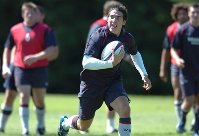 31.07.07 - Wales Rugby Press Conference - James Hook shows off his delight as he gets into space during training 
