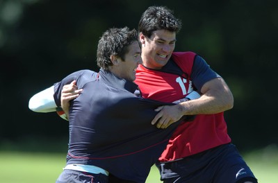 31.07.07 - Wales Rugby Press Conference - James Hook shares a joke with Mike Phillips(R) during training 