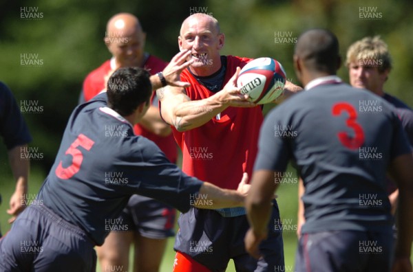 31.07.07 - Wales Rugby Press Conference - Gareth Thomas tries to get the ball past Gareth Cooper during training 