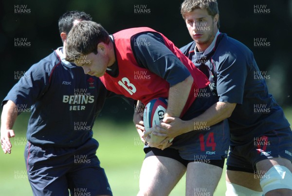 31.07.07 - Wales Rugby Press Conference - Michael Owen is tackled by Robin Sowden-Taylor during training 