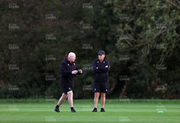 311023 - Wales Rugby Training in the week leading up to their game against the Barbarians - Skills Coach Neil Jenkins during and Head Coach Warren Gatland during training