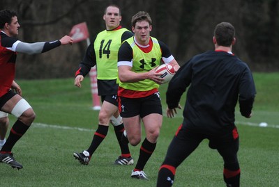 07.02.12 - Wales Rugby Training -.Dan Lydiate is supported by Gethin Jenkins(L) during training..