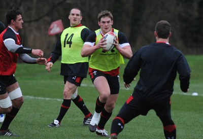 07.02.12 - Wales Rugby Training -.Dan Lydiate is supported by Gethin Jenkins(L) during training..