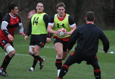 07.02.12 - Wales Rugby Training -.Dan Lydiate is supported by Gethin Jenkins(L) during training..