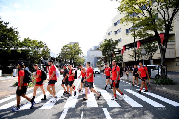 150919 - Wales Rugby Training and Media Interviews - Wales squad walk through the streets of Kitakyushu to training