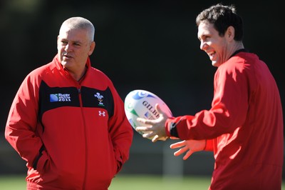 03.09.11 - Wales Rugby Training - Head coach Warren Gatland talks to Stephen Jones during training. 
