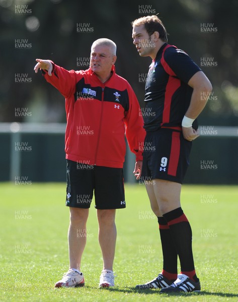 03.09.11 - Wales Rugby Training - Head coach Warren Gatland talks to Alun Wyn Jones during training. 
