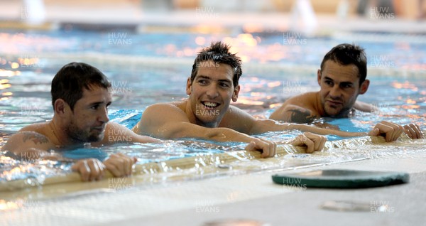 03.09.11 - Wales Rugby Pool Recovery Session - (L-R) Shane Williams, James Hook and Lee Byrne during a pool recovery session. 