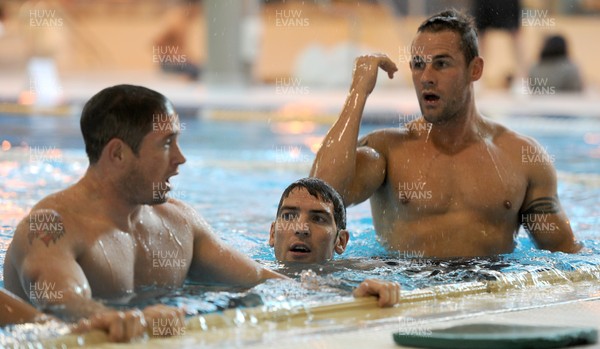 03.09.11 - Wales Rugby Pool Recovery Session - (L-R) Shane Williams, James Hook and Lee Byrne during a pool recovery session. 