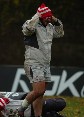 14.11.06 - Wales Rugby Training - Adam Jones tries to adjust his Children in Need bobble hat during training 
