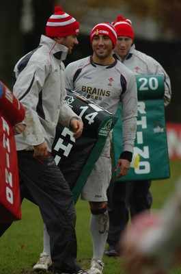 14.11.06 - Wales Rugby Training - (L-R)Mike Phillips, Gavin Henson and Tom Shanklin enjoy training in their Children in Need bobble hats 