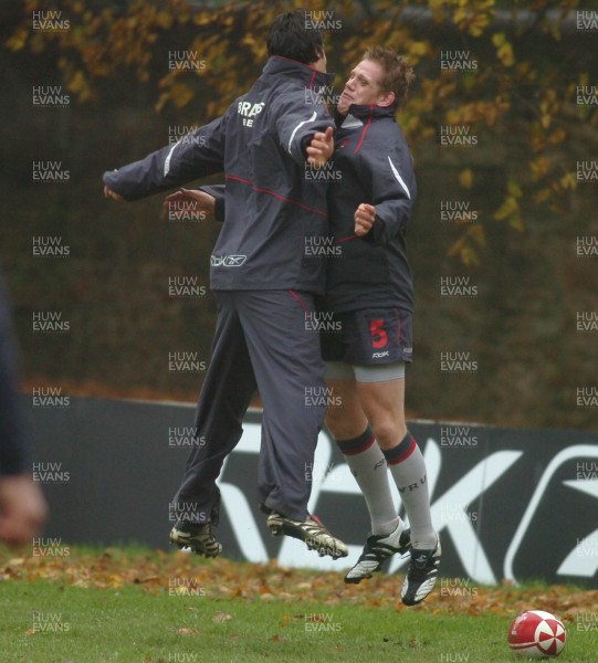 22.11.06 - Wales Rugby Training - Rhys Thomas and Mike Phillips(L) celebrate a try during training 