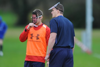 29.11.11 - Wales Rugby Training  Ian Evans and Dan Biggar wear masks with Shane Williams face on after he was named in the Wales team to play Australia, which will be his last game for his country before he retires from international rugby. 