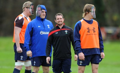 29.11.11 - Wales Rugby Training  Shane Williams looks on as team mates wear masks with his face on after he was named in the Wales team to play Australia, which will be his last game for his country before he retires from international rugby. 