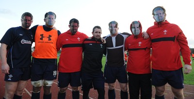 29.11.11 - Wales Rugby Training  Shane Williams with Tavis Knoyle, Toby Faletau, Ryan Bevington, Lloyd Burns, Shaun Edwards and Rhodri Jones as they wear masks with his face on after he was named in the Wales team to play Australia, which will be his last game for his country before he retires from international rugby. 