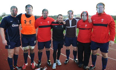 29.11.11 - Wales Rugby Training  Shane Williams with Tavis Knoyle, Toby Faletau, Ryan Bevington, Lloyd Burns, Shaun Edwards and Rhodri Jones as they wear masks with his face on after he was named in the Wales team to play Australia, which will be his last game for his country before he retires from international rugby. 