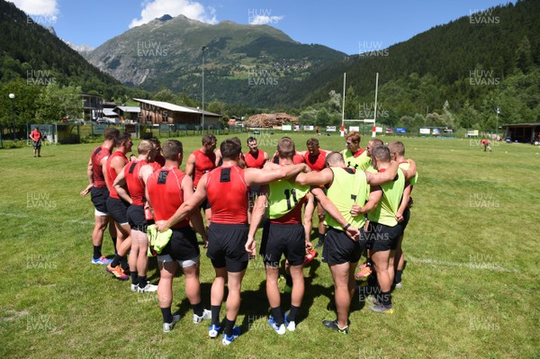 170719 - Wales Rugby World Cup Training Camp in Fiesch, Switzerland - Players huddle during training
