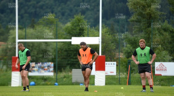180719 - Wales Rugby World Cup Training Camp in Fiesch, Switzerland - James Davies, Josh Navidi and Rhys Carre during training