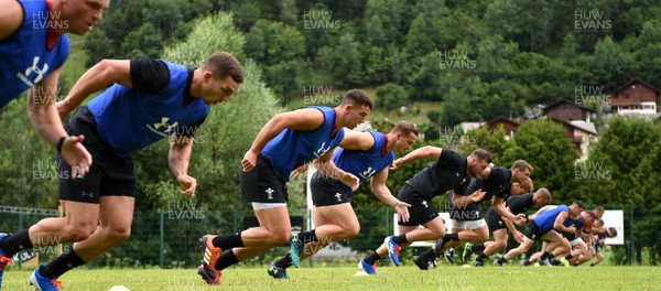 180719 - Wales Rugby World Cup Training Camp in Fiesch, Switzerland - Owen Watkin, Hallam Amos and Owen Lane during training