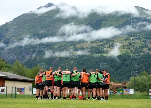 180719 - Wales Rugby World Cup Training Camp in Fiesch, Switzerland - Players huddle during training