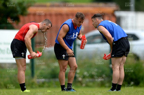 180719 - Wales Rugby World Cup Training Camp in Fiesch, Switzerland - Gareth Davies, Jarrod Evans and Tomos Williams during training