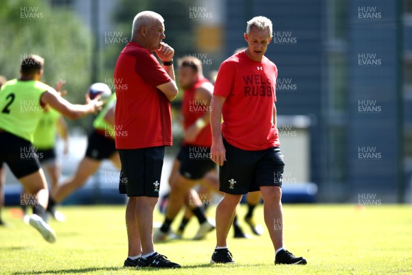 190719 - Wales Rugby World Cup Training Camp in Fiesch, Switzerland - Warren Gatland and Rob Howley during training