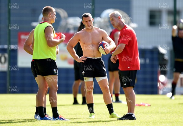 190719 - Wales Rugby World Cup Training Camp in Fiesch, Switzerland - Gareth Anscombe, Gareth Davies and Rob Howley during training