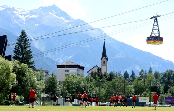 190719 - Wales Rugby World Cup Training Camp in Fiesch, Switzerland - Players train as a cable car passes