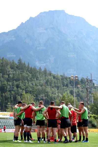 200719 - Wales Rugby World Cup Training Camp in Fiesch, Switzerland - Players huddle during training