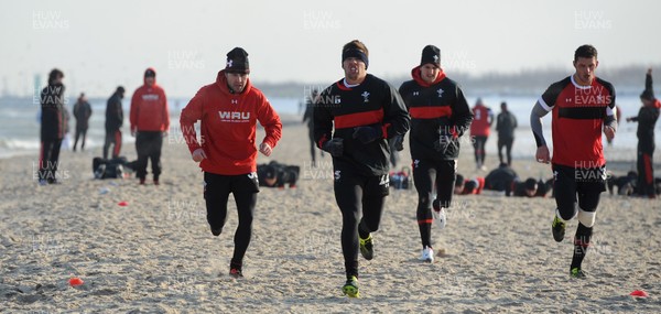 27.01.12 - Wales Rugby Training Camp in Poland - Stephen Jones, Rhys Webb, Sam Warburton and Aaron Shingler during fitness training on the beach. 