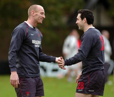 31.10.06 - WALES RUGBY Old captain Gareth Thomas and new captain Stephen Jones take part in a training session ahead of his sides clash against Australia 