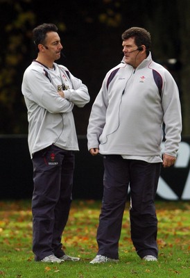 31.10.06 - WALES RUGBY Coach Gareth Jenkins (R) and assistant Nigel Davies oversee a training session ahead of their sides clash against Australia 