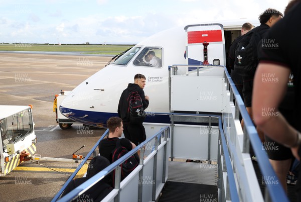 220224 - The Welsh Rugby team travel to Dublin, Ireland for their 6 Nations game on the weekend - Dafydd Jenkins boards the plane
