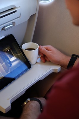040326 - Picture shows the Wales Rugby Team travelling to Dublin, Ireland for their Six Nations game against Ireland on Friday - Cup of tea on the plane