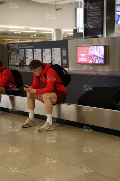 040326 - Picture shows the Wales Rugby Team travelling to Dublin, Ireland for their Six Nations game against Ireland on Friday - Ellis Mee