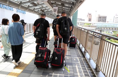 060725 - Wales Rugby travel to Kobe, Japan for their second test of the tour - Keiron Assiratti and Taine Plumtree