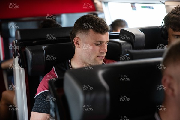 051023 - Wales Rugby travel to Nantes from Paris ahead of their final Rugby World Cup Pool game against Georgia - Mason Grady on the train